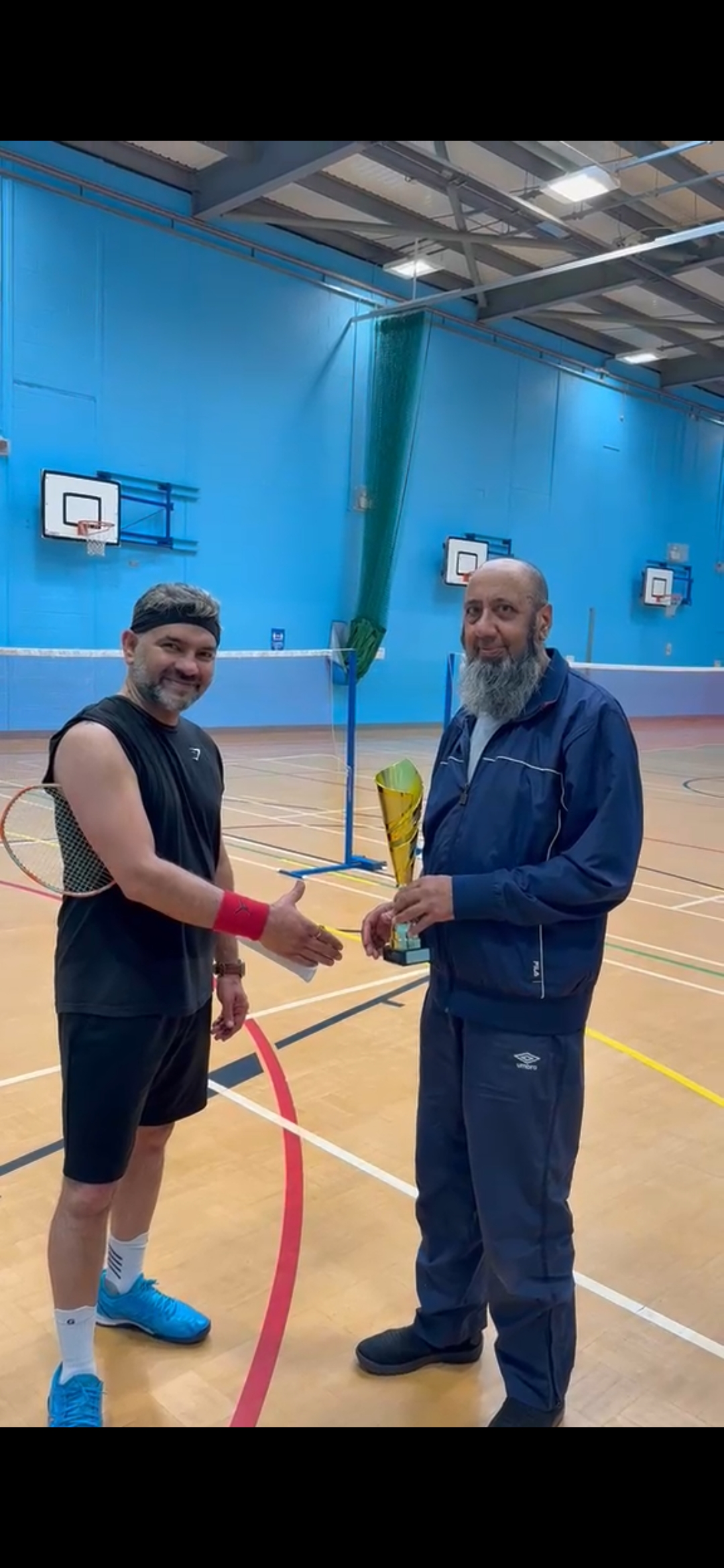 Parvez Bhai handing Trophy to Dhawal - Winner 2026