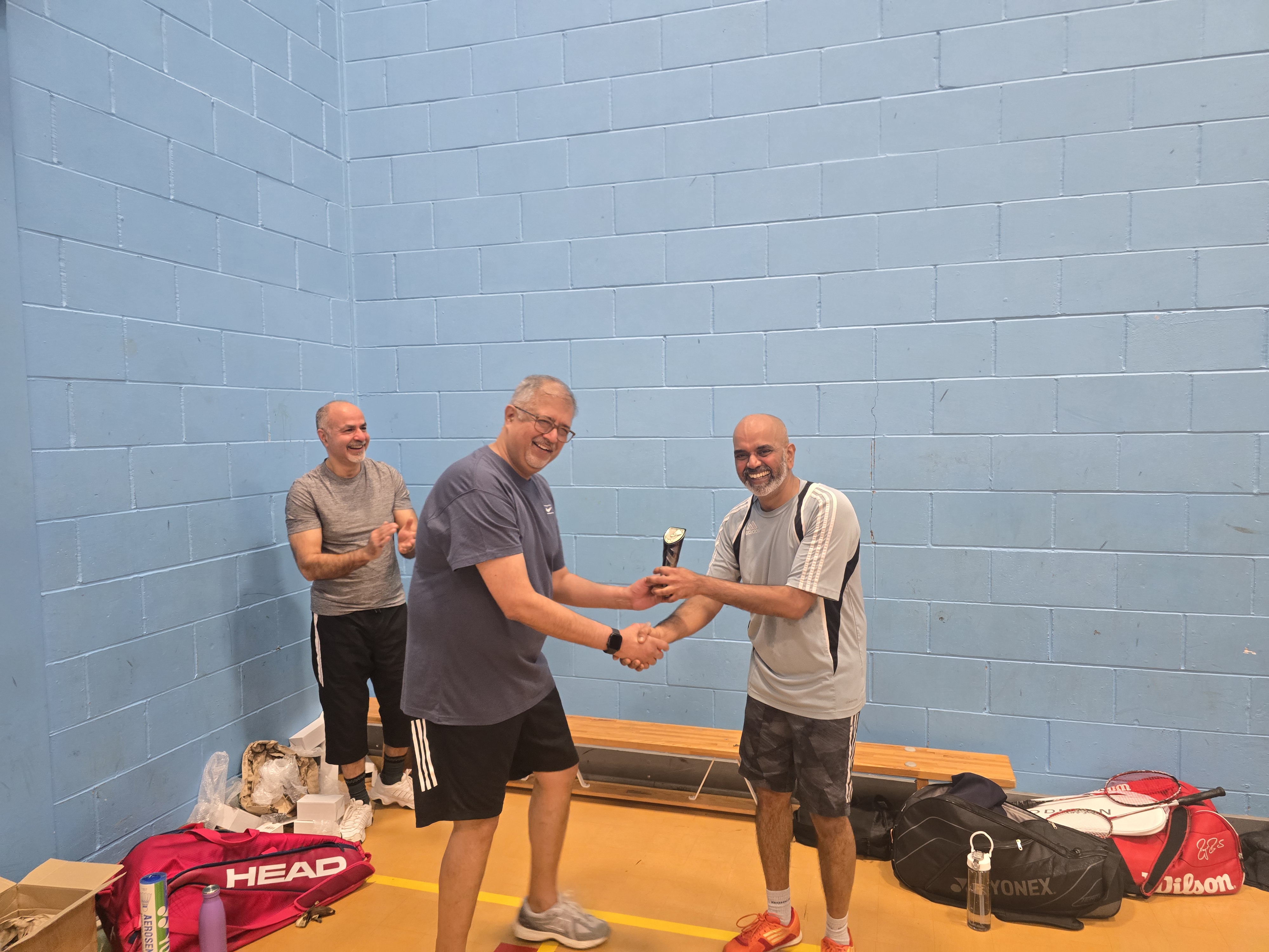 Deepak handing trophy to Shiva - Pool B Winner