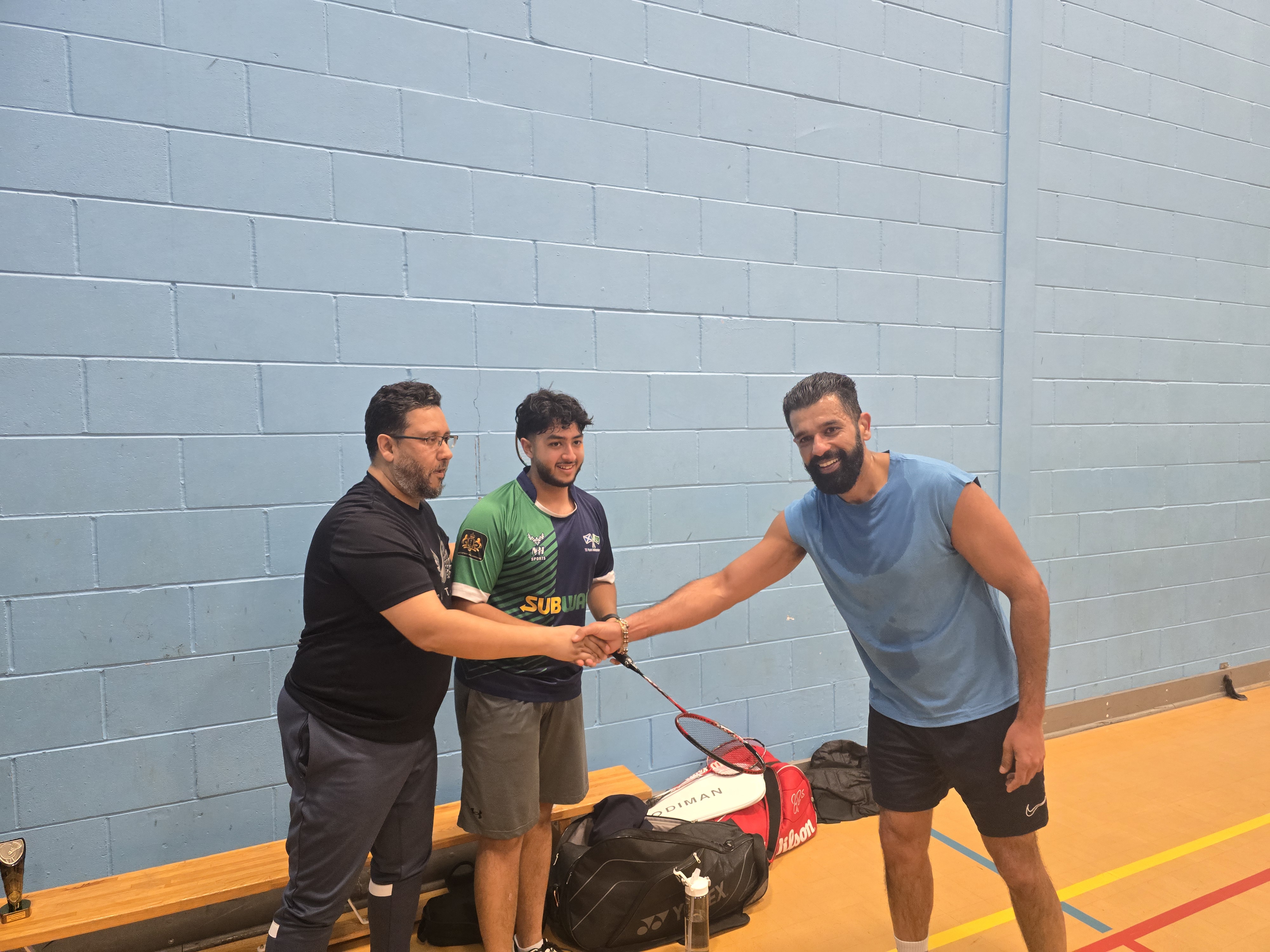 Santosh presents Pool B 3rd place Trophy