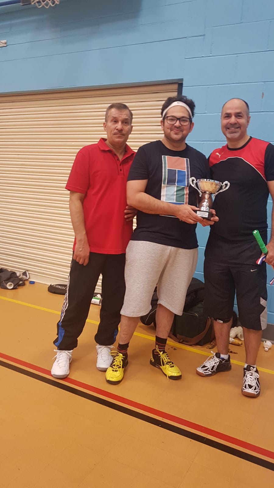 Winners receiving their trophies - Ruksar/Farrukh