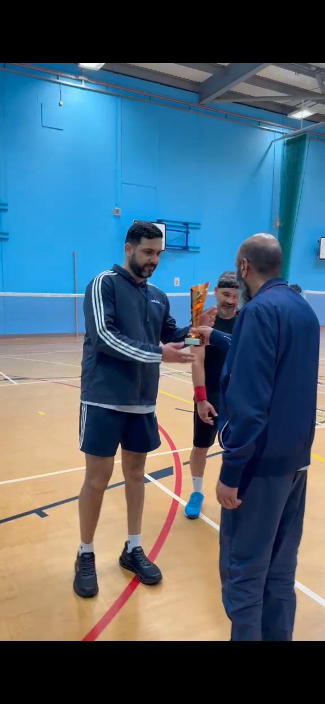 Parvez Bhai handing trophy for 3rd place to Vivek